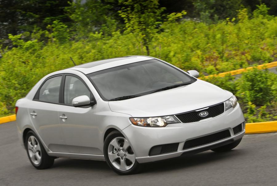  Kia Forte 2009 года  (фото 78 из 128)